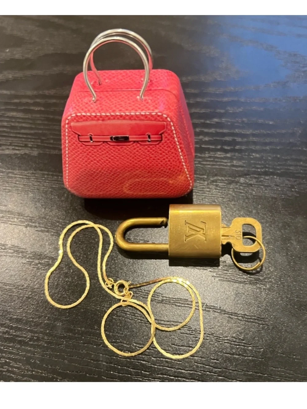 Louis Vuitton gold tone